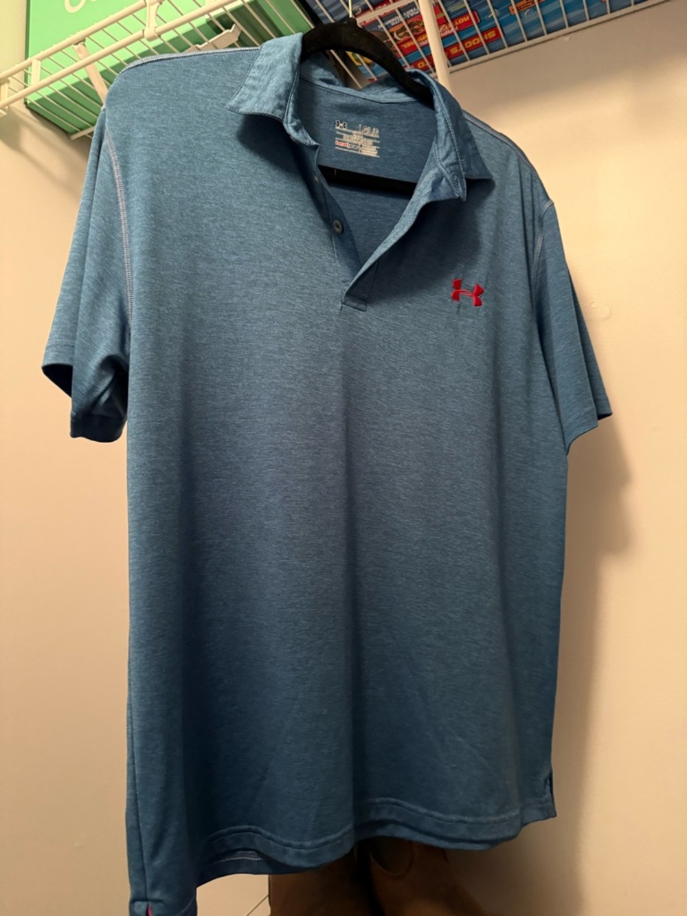 Under Armour Men’s Heather Blue Polo with Red Logo